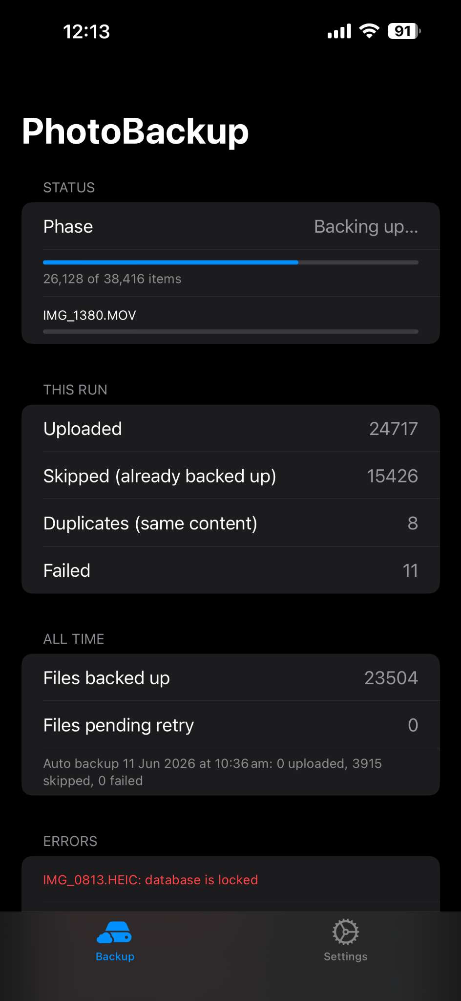 Actual early MemoryKeep app screen showing backup progress, uploaded files, skipped duplicates and backup errors